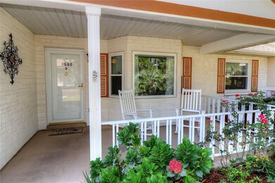 with welcoming rocking chair porch!