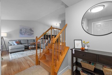 Tile floor in the foyer and hardwood floors in the