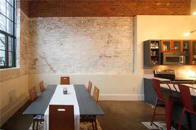 The dining area of the Great Room has an exposed b