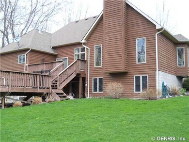 Exterior Front. Notice the 2 tiered deck leading t