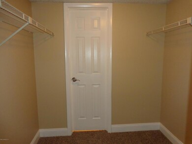 WALK IN CLOSET IN THE MASTER BEDROOM