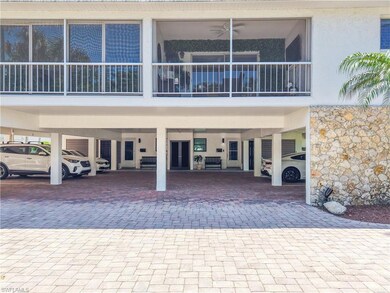 View of building exterior with a carport