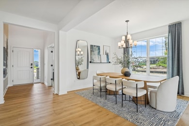 (Photo of model home, finishes will vary) Fit for casual weekend brunches and upscale celebrations alike, the formal dining space joins seamlessly with the Great Room for additional entertaining options.