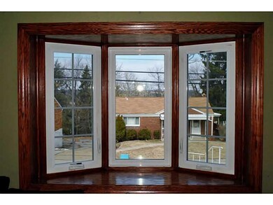Other. 3 panel new bay window with wood trim is on