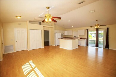 Open concept living, dining and kitchen