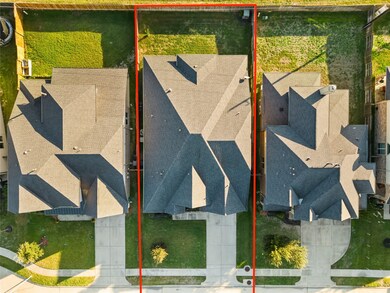 This home sits on a large lot with ample yard space in front and the back, lush landscaping and a well-maintained yard.