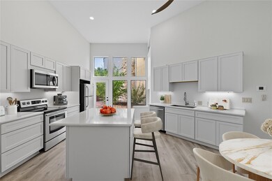 1 Crystal Springs Ct unit G, the Hills, TX 78738 - photo 3