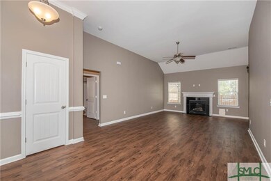 Living room with cozy fire place and 11 foot ceili