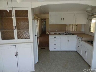 Sunny and bright kitchen with room for dining tabl