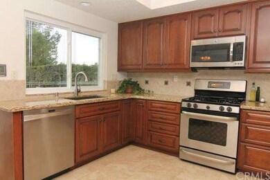Upgraded kitchen with granite counter tops, farmer