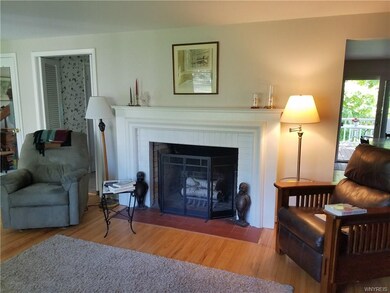 Living room with fireplace and hardwood floors