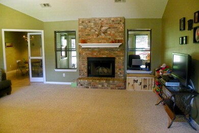 Living Area: 19 X 18 Living Rm w/Vaulted Ceiling.