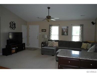 Living room with view from the kitchen.