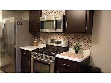 Kitchen. New SS Appliances & Tile Backsplash
