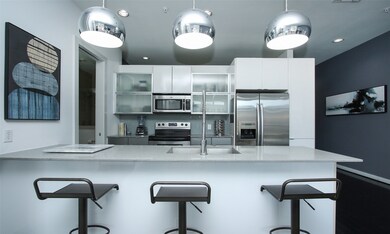 Modern lighting fixtures and an island for your fr