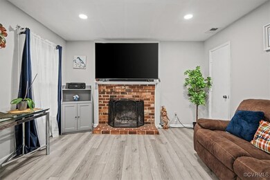 Living room featuring light wood-type flooring and