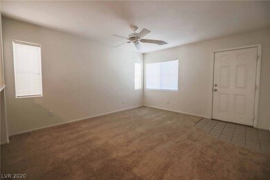 Downstairs great room, kitchen, and powder bath -