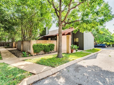 View of front of house with brick siding