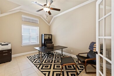 Private study with French doors wired for Surround Sound. Powder bath is adjacent