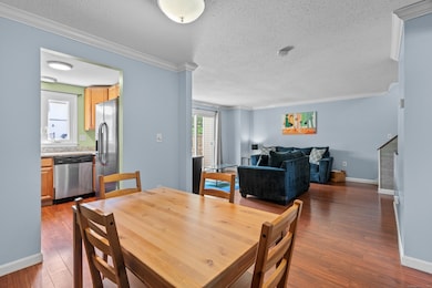 Open concept dining room/ living room.