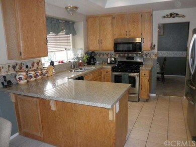 Kitchen has garden window over sink, refinished ca