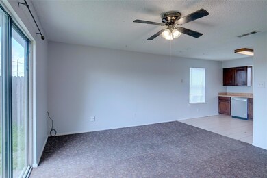 Unfurnished living room with light carpet, plenty 