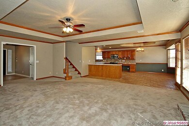 Family room open to kitchen and dining
