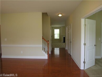 Entry. Dining room to the left, hallway to the Great Room and Kitchen