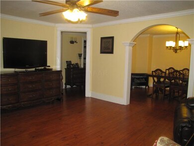 Living room is open and spacious  which leads into