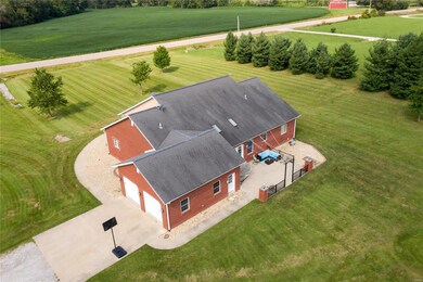 2-Car garage - built in shelving, chalkboard and whiteboard. Has stair access to lower level.