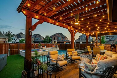 Patio terrace at dusk featuring a lawn, an outdoor living space, a fenced in pool, and a pergola