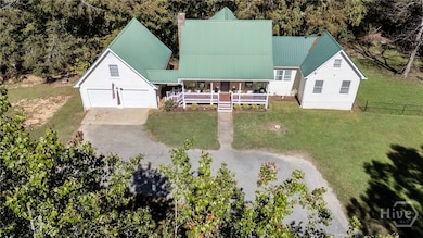 4 Bedrooms &  a Separate Bonus Room plus 3 full baths! Garage can be finished for an apartment also!