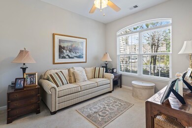 Living room featuring carpet flooring and ceiling 
