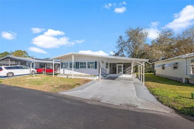 34633 Rosebud Row, Zephyrhills, FL 33541 - photo 2