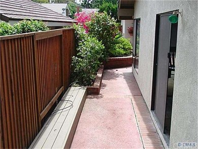 Side Yard connecting central patio with back yard