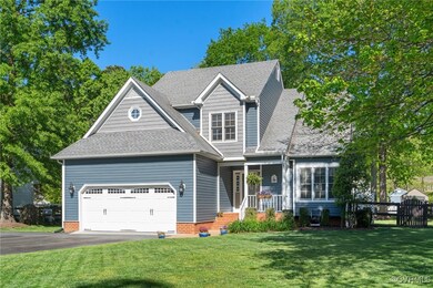 Craftsman-style house with covered porch, driveway