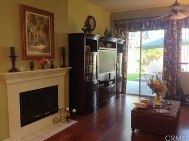 Family Room with Ceramic logs in Fireplace