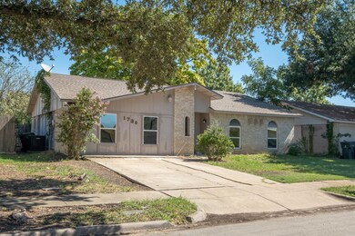 View of front of home featuring cooling unit and a