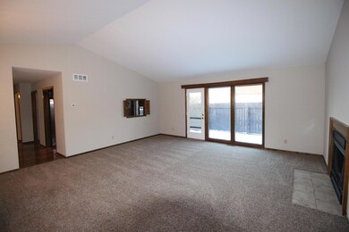 Light Filled Great Room w/ FP.