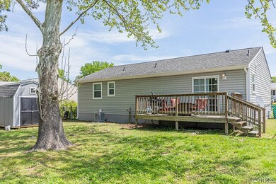 REAR ELEVATION, DECK, FENCEDIN BACKYARD, DETACHED SHED
