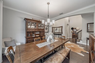 Formal dining room looking to garage entry hallway