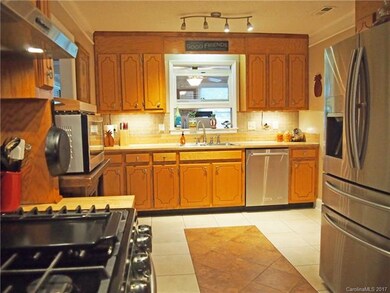 Bright kitchen with 2 year old appliance including