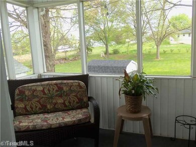Enclosed Porch. screened in back porch, overlooks large green yard. great for kids or entertaining