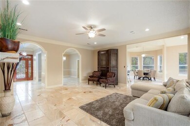Designer Travertine floors throughout, Den has ope