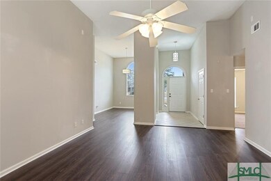 Great room looking back to foyer and dining room