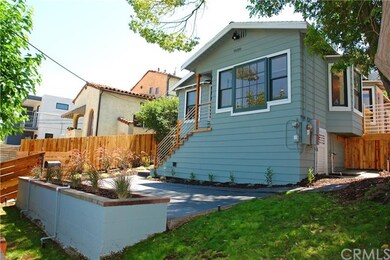 Front patio area and shaded yard.
