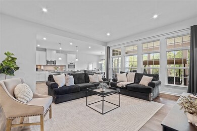 jaw dropping living room with large floor to ceili