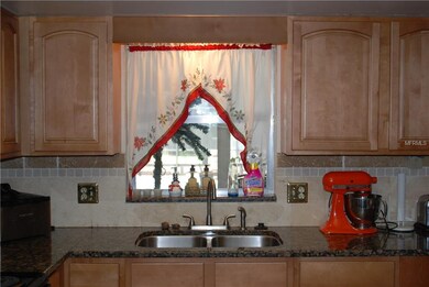 Wood Kitchen Cabinets and Granite Counter tops