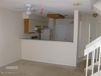 Kitchen overlooks family room