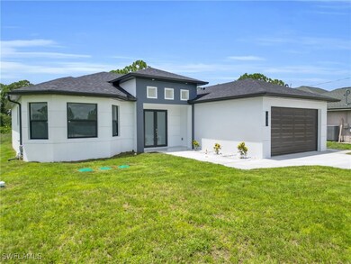 Prairie-style house featuring french doors, stucco